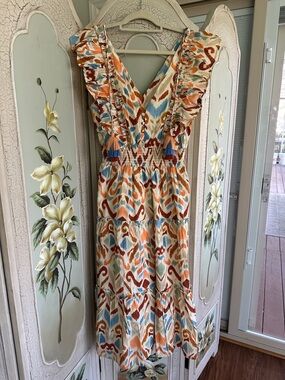 Ruffled V-Neck Midi Dress in Cream with Orange & Blue Print